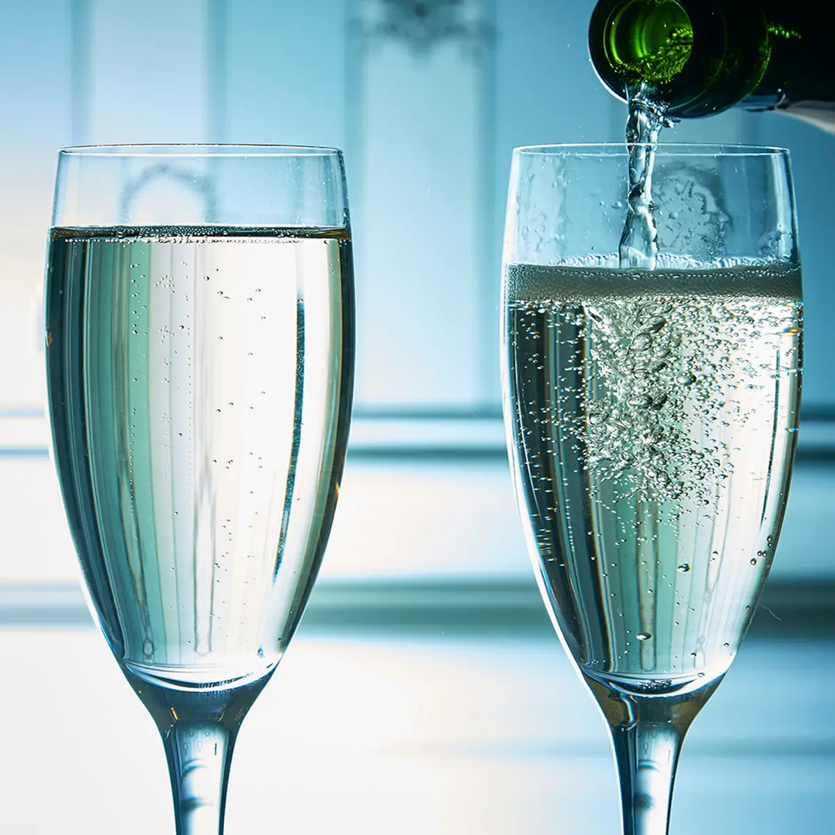 Close up of 2 Full Champagne glasses