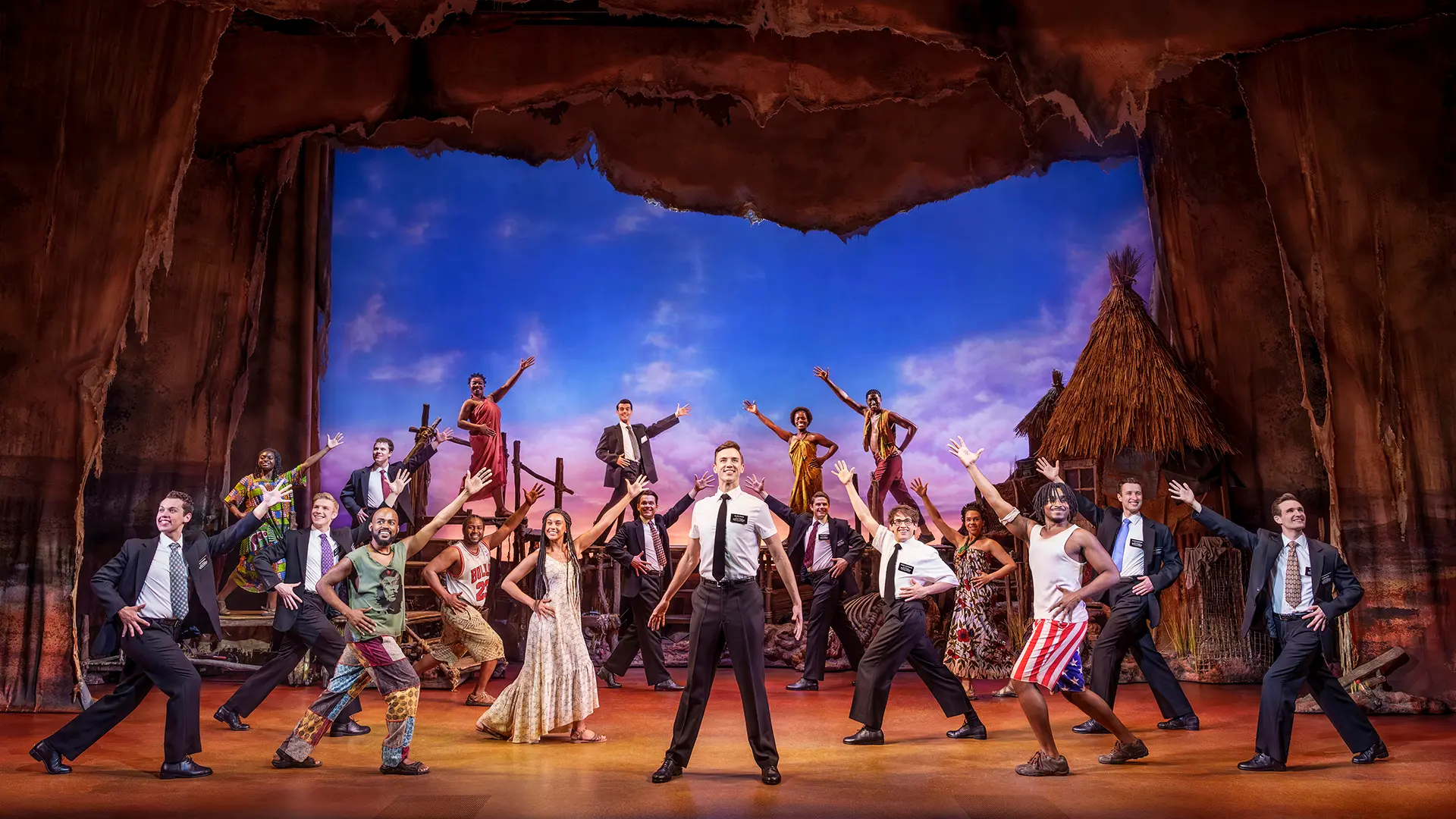 The Book of Mormon London Company. Photography by Paul Coltas