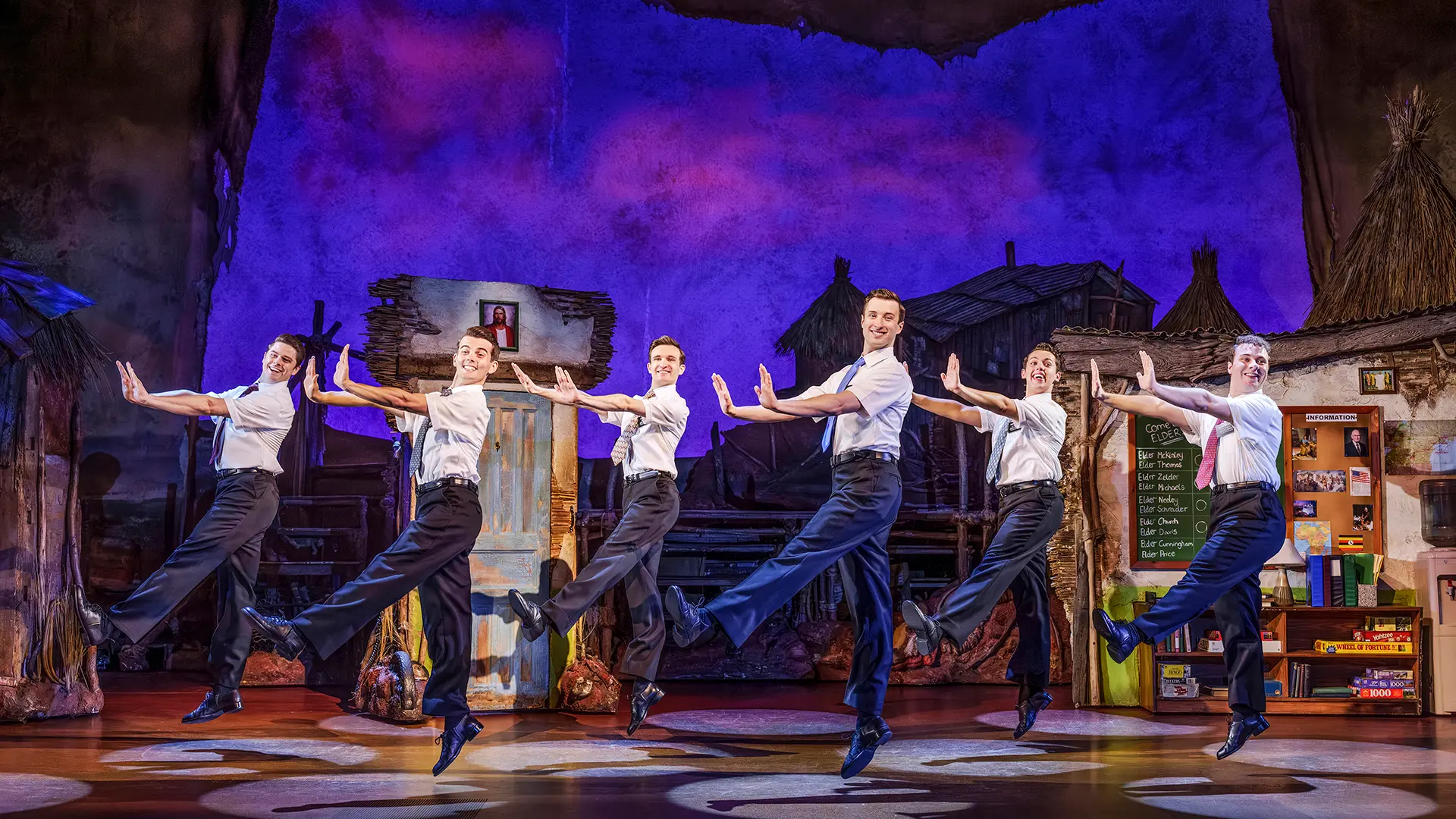 The Book of Mormon London Company. Photography by Paul Coltas